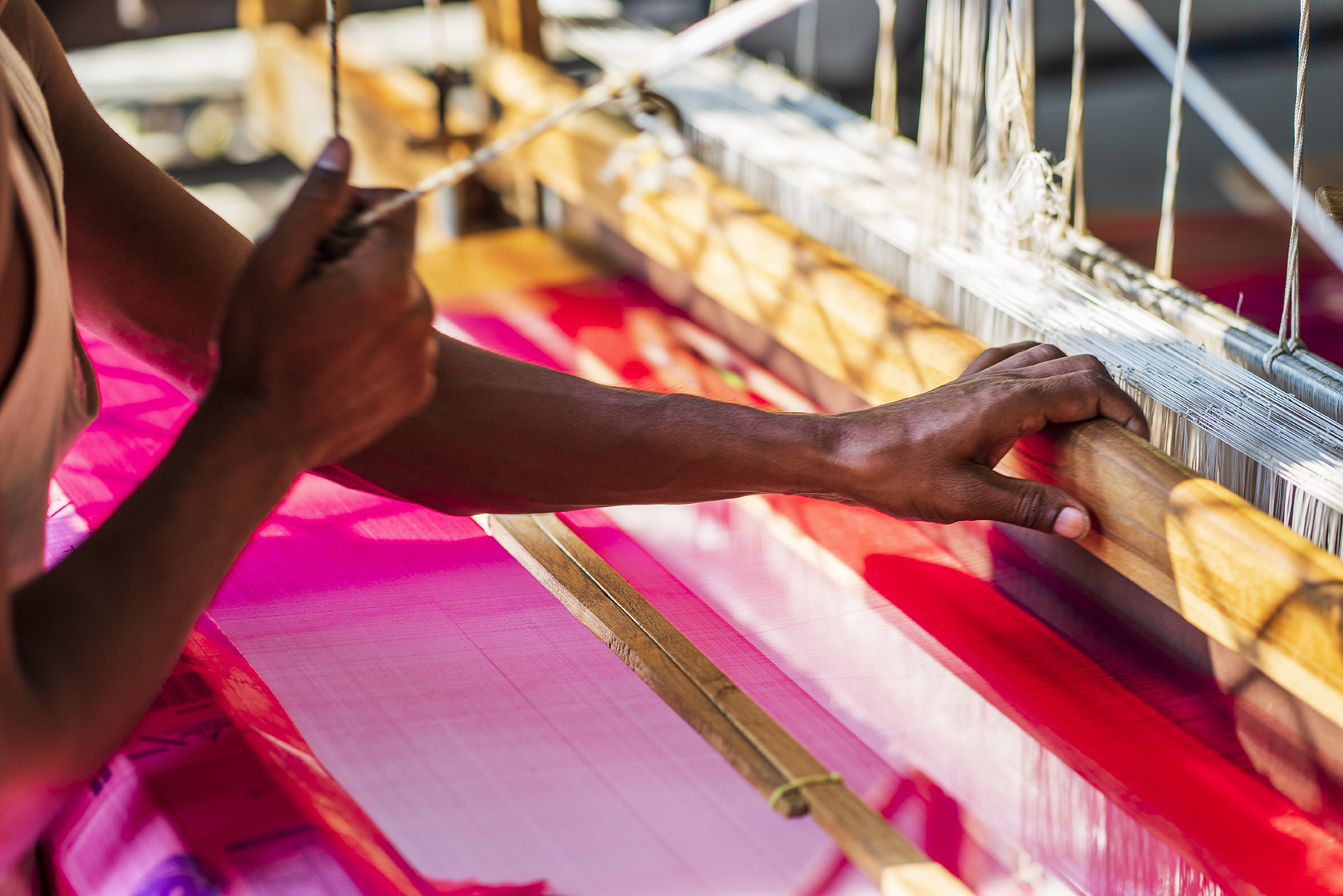 weaver on loom